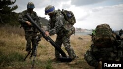 South Korean marines take part in a U.S.-South Korea joint landing operation drill as a part of the two countries' annual military training called Foal Eagle, in Pohang, South Korea, April 2, 2017.