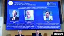 Member of the Nobel Committee for Physics announce the winners of the 2021 Nobel Prize at the Royal Swedish Academy of Sciences in Stockholm, Sweden Oct. 5, 2021.