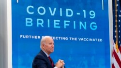 President Joe Biden meets with the White House COVID-19 Response Team in the South Court Auditorium in the Eisenhower Executive Office Building on the White House Campus in Washington, Jan. 4, 2022.