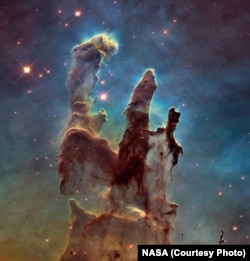 These towers of gas and dust in the Eagle Nebula are known as the Pillars of Creation because within them, hundreds of new stars are being created.