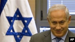 Israeli Prime Minister Benjamin Netanyahu takes part in his party's faction meeting in the Knesset, Israel's parliament in Jerusalem, March 28, 2011