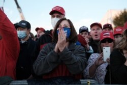 Hundreds arrive for a President Donald Trump rally in support of Republican Senators David Perdue and Kelly Loeffler on Dec. 5, 2020, in Valdosta, Georgia.