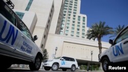The United Nation vehicles carrying the Organization for the Prohibition of Chemical Weapons (OPCW) inspectors is seen in Damascus, Syria, April 18, 2018.