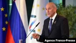 FILE - Slovenia's Prime Minister Janez Jansa gestures as he delivers a speech during a press conference at the Brdo Congress Centre, near Ljubljana, Oct. 6, 2021. 