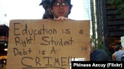 FILE - A college student voices his opinion on education and student debt during the Occupy Wall Street movement in New York City, Oct. 9, 2011. (Photo by Phineas Azcuy)