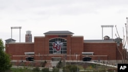 FILE - Liberty University's football stadium is empty as students were welcomed back to the university's campus in Lynchburg, Va., March 24 , 2020.