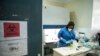 FILE - A laboratory specialist secures samples taken from potential coronavirus patients in Juba, South Sudan, June 19, 2020.
