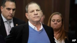 FILE - Harvey Weinstein listens during a court proceeding in New York, May 25, 2018. 