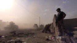 Mosul Civilians Sift Through Rubble as Coalition Takes Fiercely Held Neighborhoods