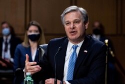 FBI Director Christopher Wray speaks during a Senate Select Committee on Intelligence hearing about worldwide threats, on Capitol Hill in Washington, April 14, 2021.