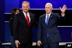 FILE -- Republican vice-presidential nominee Gov. Mike Pence and Democratic vice-presidential nominee Sen. Tim Kaine, left, met at Longwood University in Farmville, Virginia, for their debate Oct. 4, 2016.