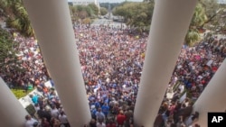 Protesters rally against gun violence on the steps of the old Florida Capitol in Tallahassee, Fla., Wednesday, Feb 21, 2018. (AP Photo/Mark Wallheiser)