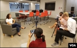 Megan Majocha being interviewed.