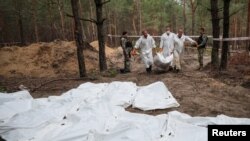 Mass burial site discovered in Izium