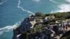 Tourists enjoy the view from Cape Point on the southern tip of the Cape Peninsula, about 50 kilometers south of Cape Town, South Africa, May 2010.
