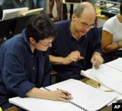 Robert Spano confers with Pulitzer Prize-winning composer Jennifer Higdon.