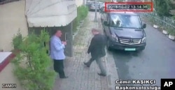 This image taken from CCTV video obtained by the Turkish newspaper Hurriyet and made available on Oct. 9, 2018 claims to show Saudi journalist Jamal Khashoggi entering the Saudi consulate in Istanbul, Oct. 2, 2018.