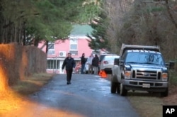 An entrance to the grounds of a riverfront compound near Centreville, Maryland, that has been used by Russian Federation diplomats for years is blocked to reporters by state department personnel, Dec. 29, 2016.