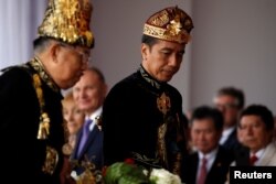 Presiden Joko Widodo didampingi Wakil Presiden Jusuf Kalla tiba untuk perayaan Hari Kemerdekaan ke-74 RI di Istana Kepresidenan, Jakarta, 17 Agustus 2019.