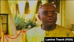 Remis Dandjinou, porte-parole du gouvernement, au Burkina Faso, le 4 avril 2019. (VOA/Lamine Traoré)