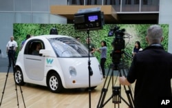 The Waymo driverless car is displayed during a Google event, Tuesday, Dec. 13, 2016, in San Francisco.
