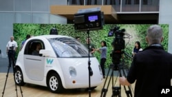 The Waymo driverless car is displayed during a Google event, Tuesday, Dec. 13, 2016, in San Francisco.