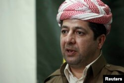 Masrour Barzani heads the Iraqi Kurdish region's national security council. He's shown at a news conference in Dohuk province, Dec. 18, 2014.
