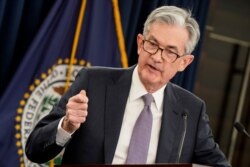 제롬 파월 연방준비제도(FED) 의장이 11일 기자회견을 열고 기준금리 동결을 발표하고 있다.