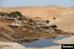 A wastewater pond is seen in the Palestinian Bedouin village of Khan al-Ahmar that Israel plans to demolish, in the occupied West Bank Oct. 2, 2018.