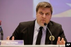 Olli Kotro, leader of The Finns Party talks to journalists during a press conference in Milan, April 8, 2019.
