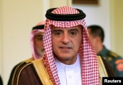 FILE - Saudi Arabia Foreign Minister Adel bin Ahmed Al-Jubeir arrives to meet Indonesia President Joko Widodo at presidential palace in Bogor, Indonesia, Oct. 22, 2018.