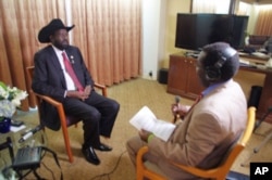 President of South Sudan Salva Kiir and VOA South Sudan in Focus host John Tanza at UN on Saturday, September 24,2011