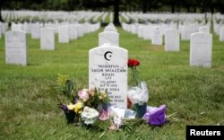 The grave of Army Captain Humayun Khan lies at Arlington National Cemetery in Arlington, Virginia, U.S., August 1, 2016.