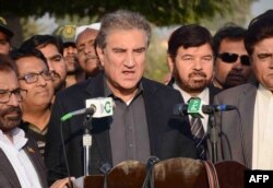 FILE - Pakistani Foreign Minister Shah Mehmood Qureshi talks with media representatives in Multan, Pakistan, Dec. 22, 2018.