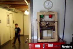 A 3-D printer is pictured at TechShop in the South of Market neighborhood in San Francisco, California, April 24, 2014.