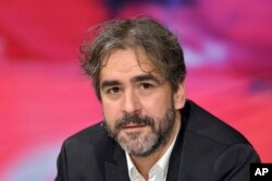 FILE - In this July 21, 2016, photo German-Turkish journalist Deniz Yucel is pictured during a talkshow in Berlin, Germany.