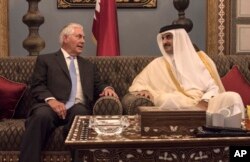 U.S. Secretary of State Rex Tillerson meets with the Emir of Qatar, Sheikh Tamim Bin Hamad Al Thani at the Sea Palace, in Doha, Qatar, Tuesday, July 11, 2017.