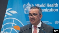 FILE - WHO Director-General Tedros Adhanom Ghebreyesus addresses the special session of the World Health Assembly in Geneva, in this handout picture made available by the World Health Organization on Nov. 29, 2021.