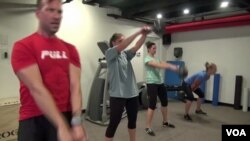 Exercisers at the Roam Fitness gym in downtown Washington