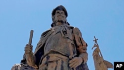 This bronze statue of Don Juan de Onate leading a group of Spanish settlers from an area near what is now Ciudad Chihuahua, Mexico, to what was then the northern most province of New Spain in 1598 stands outside the Albuquerque Museum, N.M., June 12, 2020