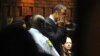 Athlete Oscar Pistorius weeps in court in Pretoria, South Africa, Feb 15, 2013, at his bail hearing in the murder case of his girlfriend Reeva Steenkamp. 