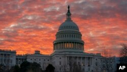 The Capitol is seen at dawn as Congress returns to work in Washington, March 5, 2019.