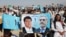 Supporters of Afghan presidential candidate Abdullah Abdullah attend a campaign rally in the Paghman district of Kabul, Afghanistan, June 9, 2014.