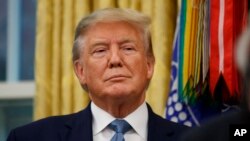 រូបឯកសារ៖ ប្រធានាធិបតីអាមេរិកអំឡុងពេលពិធីមួយនៅសេតវិមាន ក្នុងរដ្ឋធានីវ៉ាស៊ីនតោន កាលពីថ្ងៃទី០៨ ខែតុលា ឆ្នាំ២០១៩។ 