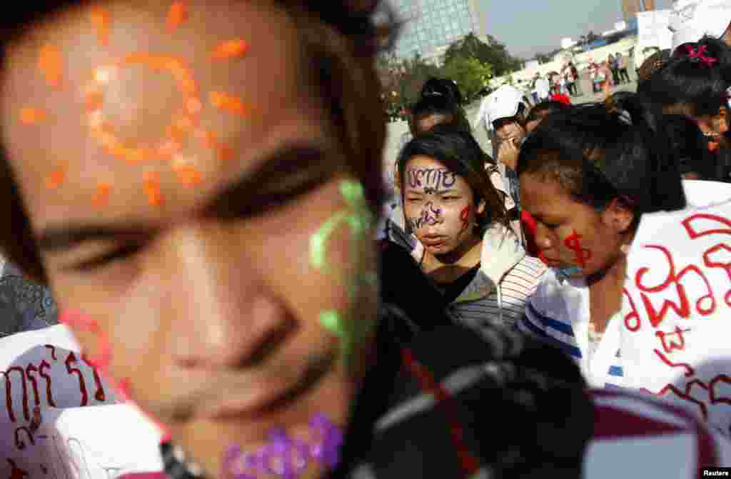 Garment workers attend a march to mark May Day in Phnom Penh, Cambodia, May 1, 2013. 