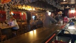 Inside the Little Missouri Saloon &amp; Dining Room in Medora, North Dakota. While the state has the most new coronavirus cases per capita, the pandemic has largely missed Medora, says owner Jim Bridger. (VOA/Matt Haines)