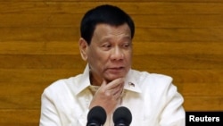 Philippine President Rodrigo Duterte delivers his State of the Nation address at the House of Representatives in Quezon city, Metro Manila, Philippines July 23, 2018.