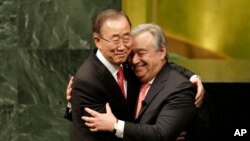 Current Secretary-General Ban Ki-moon, left, hugs U.N. Secretary-General designate Antonio Guterres after Guterres was sworn in at U.N. headquarters, Monday, Dec. 12, 2016. (AP Photo/Seth Wenig)