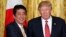 President Donald Trump and Japanese Prime Minister Shinzo Abe shake hands following their joint news conference in the White House in Washington, Feb. 10, 2017. 