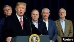 Presiden AS Donald Trump berbicara kepada media setelah pertemuan dengan partai Republik di Camp David, Maryland, 6 January 2018.
